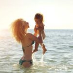 mom and baby in the water