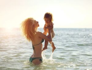 mom and baby in the water