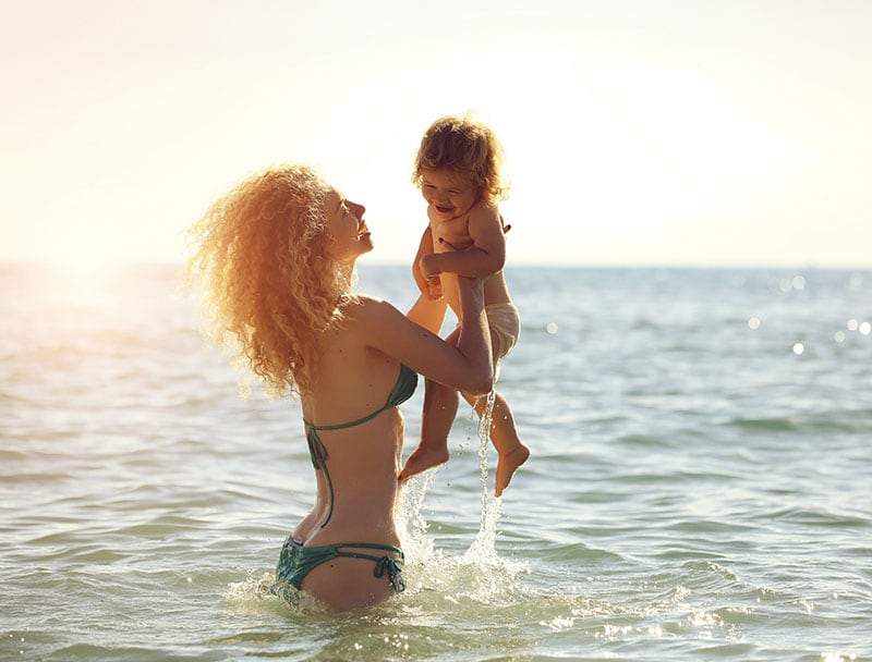 mom and baby in the water