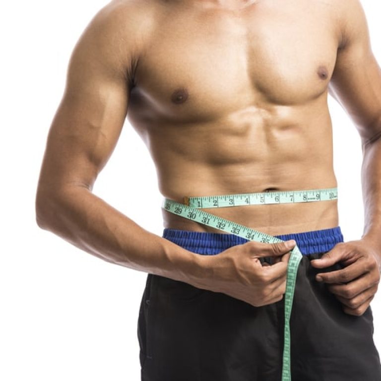 man-measuring
